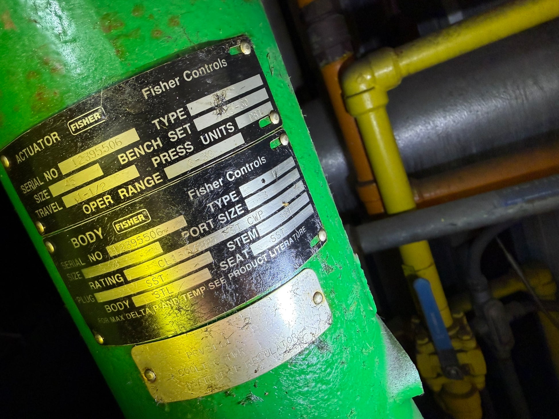 VL-26: Fisher 3-inch cooling-tower makeup control valve. nameplate photograph 2.