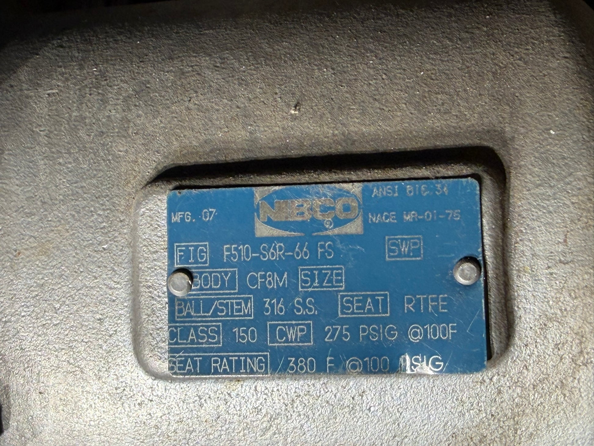 VL-32: NIBCO 4-inch stainless flanged ball valve. nameplate photograph 2.